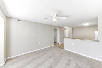 Spacious room with ceiling fan